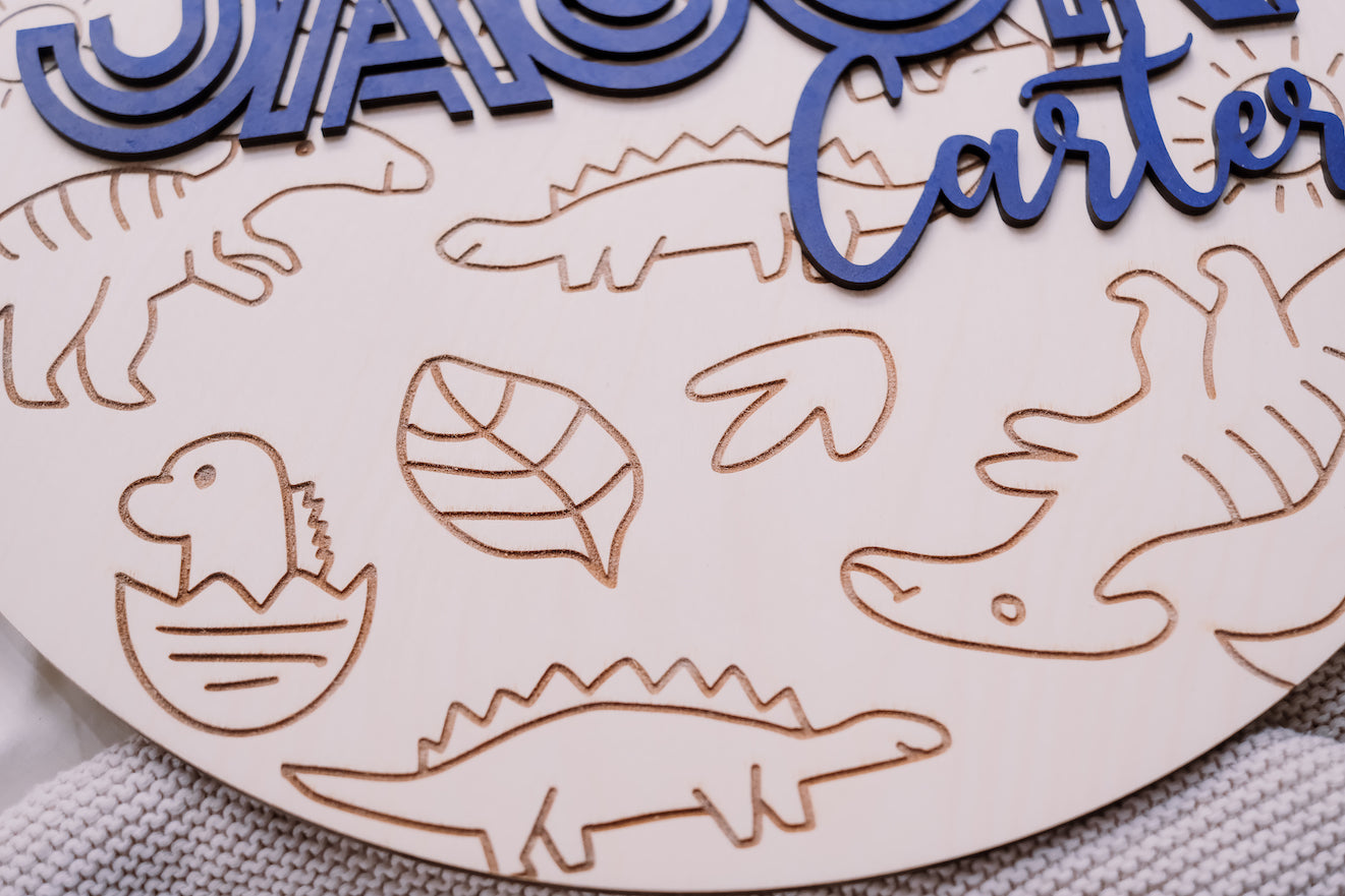 Round Dinosaur Silhouette Nursery Sign